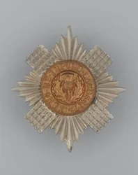 Insignia de gorra, c.1896-1920 (metal)