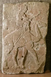 Relieve con jinete de dromedario