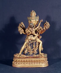 Hevajra y Nairatmya (bronce dorado con incrustaciones de plata)