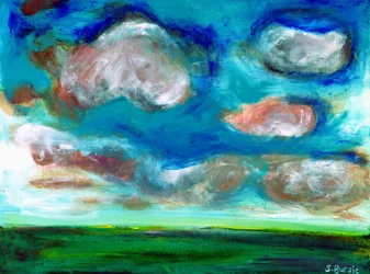 Nubes de vivos colores sobre el campo