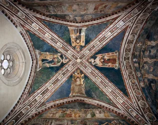 Vista de los frescos que decoran una de las bóvedas de la Iglesia Superior que representa a los cuatro doctores de la Iglesia Romana: Ambrosio de Milán