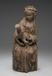 Figura sentada de la Virgen sosteniendo al Niño Jesús