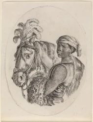 Mozo de cuadra negro con un caballo árabe
