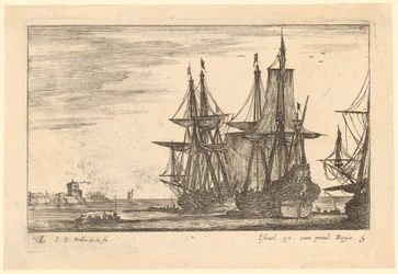 Marina con dos barcos izando las velas