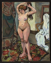 Gilberte desnuda peinándose
