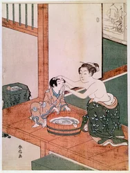 Una madre desnuda lava a su hijo en Japón junto a una palangana llena de agua. Estampa de Suzuki Harunobu (1725-1770). 1766-1768. Dimensiones: 0,27 x 0,201 m. París, Museo Guimet, Museo Nacional de Artes Asiáticas