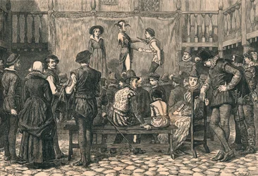 Una obra en un patio de una posada de Londres, en la época de la Reina Isabel, c1873