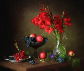Gladiolos y fruta madura