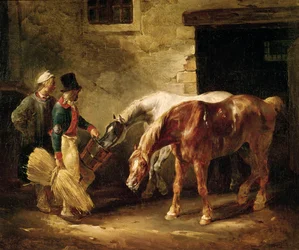 Dos caballos de posta en la puerta de un establo