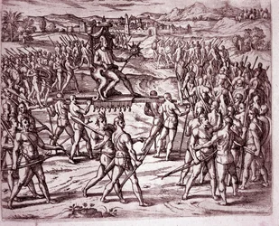 El rey inca Atahualpa (o Atabaliba), que sostiene un cetro en forma de sol, es llevado en una litera para encontrarse con Francisco Pizarro