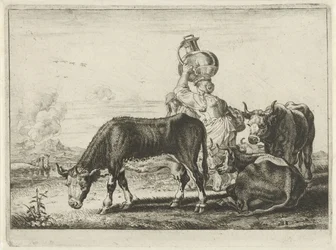 Vacas y dos lecheras