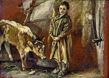 Niño con un ternero atado