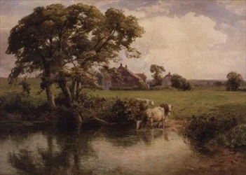Ganado bebiendo cerca de una granja
