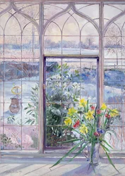Narcisos y reloj de sol contra la nieve