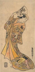 El actor Nakamura Shichisaburo II, 1703-1774 como una mujer con abanico