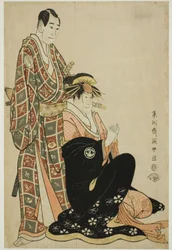 Los actores Segawa Kikunojo III (D) como la cortesana Katsuragi y Sawamura Sojuro III (I) como Nagoya Sanza Motoharu