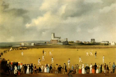 Un partido de cricket en Christchurch Priory, Hampshire