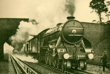 Una locomotora del Pacífico recogiendo agua a una velocidad de 2,500 galones en diez segundos - Londres y Norte
