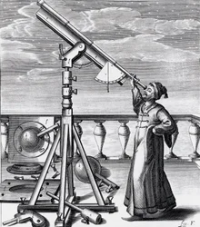 Telescopio astronómico con observador