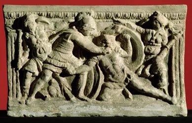 Escena de batalla de una urna cineraria, Etrusca