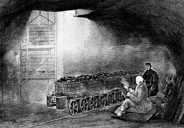 Fondo de un pozo en una mina de carbón con un tren de vagones cargados, 1860