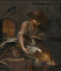 Niño con aves de corral