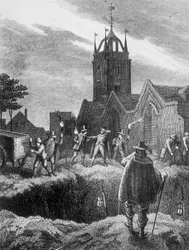 Llenando una fosa común por la noche durante la Plaga de Londres, c. 1665