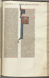 Fol. 452r, Filipenses, inicial historiada P, Pablo de pie con una espada y un pergamino, hablando con t