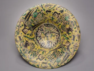 Cuatro figuras humanas alrededor de un caballo y un guepardo, 900s