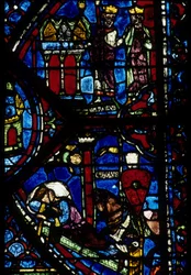 Arquitectura gótica. Historia de Carlomagno (detalle): Carlomagno recibe 3 cacerías (alto) y Visión de Constantino (I, emperador bizantino). Vidriera del deambulatorio norte, absidal. Catedral de Chartres