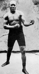 Jack Johnson, el primer campeón mundial de boxeo de peso pesado negro, 1908-1951