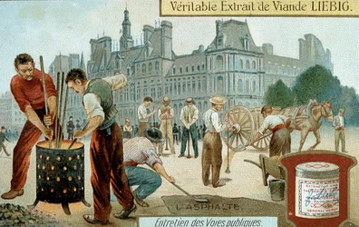 Colocación de una superficie a base de asfalto en una calle de París, c1900