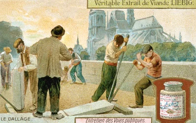 Colocación de losas en una calle de París, c1900