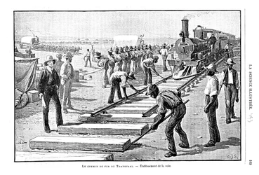 Colocación de durmientes y rieles en la vía permanente del Ferrocarril de Transvaal, Sudáfrica, 1893