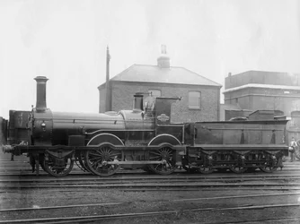 Locomotora No 148 del Ferrocarril de Londres y Suroeste LSWR, Colne con su tender, c1880