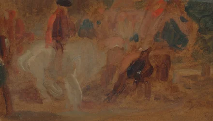 Hombre en un caballo blanco