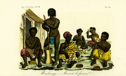 Hombres Muchicongo y muchas esposas fuera de una choza, Angola