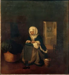 Costurera junto a una cuna