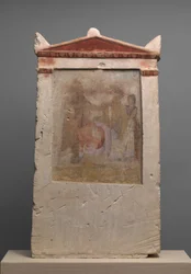 Estela funeraria de piedra caliza pintada con una mujer en parto, finales del siglo IV-principios del siglo III a.C.