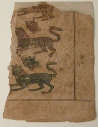 Filas de animales alternando con cabezas cortadas, folio de un manuscrito, siglos XI-XII
