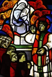 Vidriera que representa a Don Bosco en la iglesia de Notre-Dame-de-la-Trinité, Blois, Francia