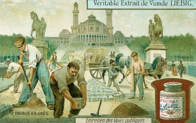 Pavimentación de una carretera con adoquines de granito, París