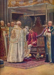 La unción: El arzobispo haciendo la señal de la cruz en la cabeza del rey