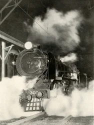 El Sydney Limited saliendo de la estación Spencer Street, Melbourne, a las 6 p.m, 1935-36
