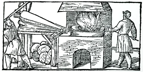 Usando fuelles para aumentar el tiro en un horno, 1540