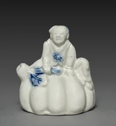 Gotero en forma de niño chino sentado en una calabaza, siglo XVIII-XIX