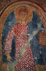 Figura de santo, fresco en la Capilla de San Nicolás (siglos XI-XV), Mottola, Puglia, Italia