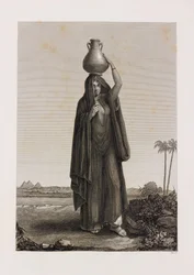 Mujer llevando una jarra