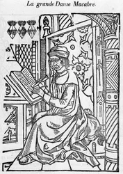 Autor de la gran danza macabra escribiendo