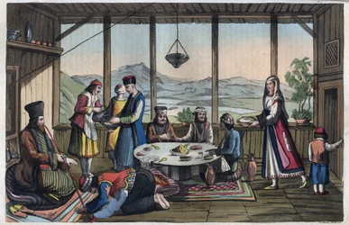 Escena de banquete en Grecia en el siglo XIX - grabado de «Usi e Costumi di Tutti i Popoli dell